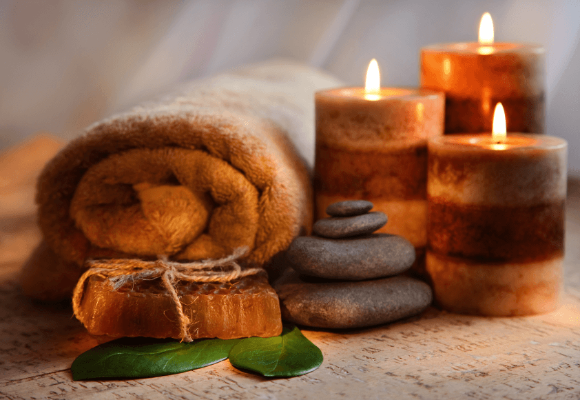 Elegant spa candles and calming decor at Hands On HealthCare Massage Therapy in Commack, Long Island.